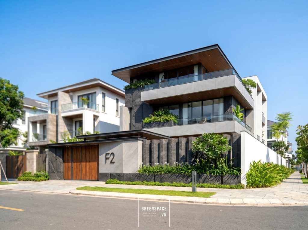 Thi công biệt thự xanh hiện đại – V’Villa và cách hoàn thiện hình khối bằng mái lớn và vật liệu tự nhiên